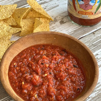 Bowl of salsa with tortilla chips.