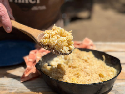 Cowboy Kent Rollins' baked parmesan romano macaroni and cheese in a cast iron skillet