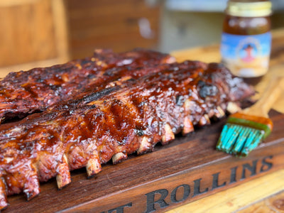 Tender backyard bbq ribs based with red river mud bbq sauce