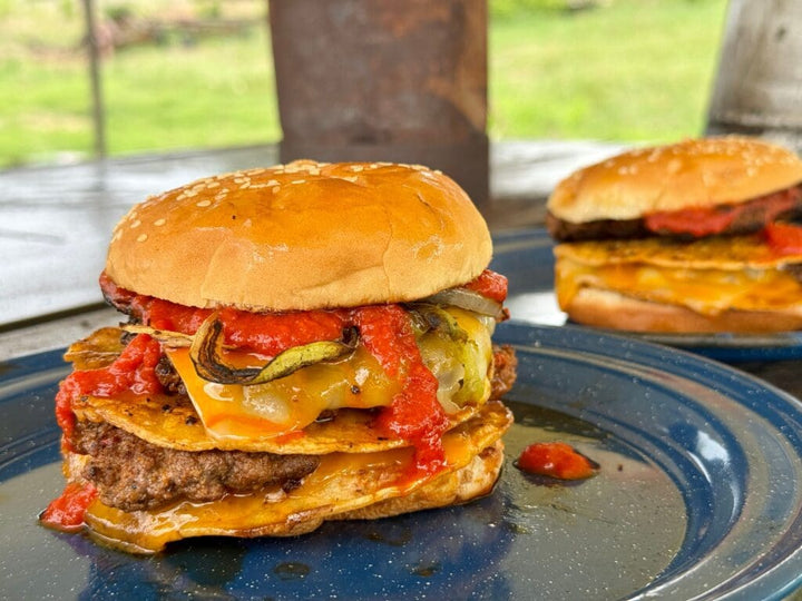 Delicious double cheeseburger with sauce.