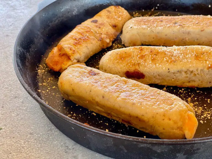 A pan with some sausage in it