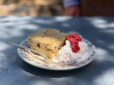 A plate of Dolly Madison's homemade strawberry ice cream and a slice of spiced election cake