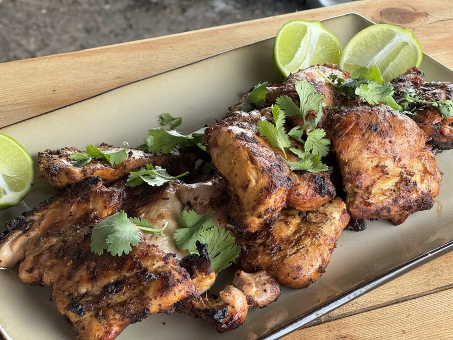 Grilled chicken thighs with lime and cilantro.