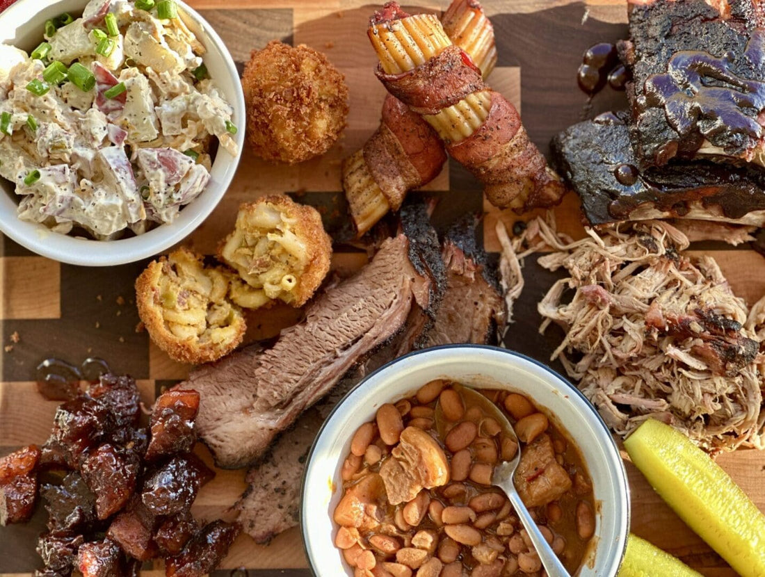 BBQ platter with sides and pickles.
