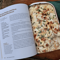 Scalloped potatoes with ham and green onions.