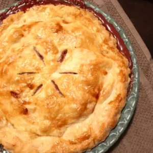 A baked pie with a golden crust.