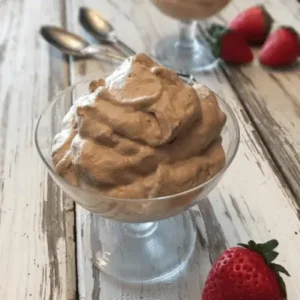 Chocolate mousse in a glass bowl.