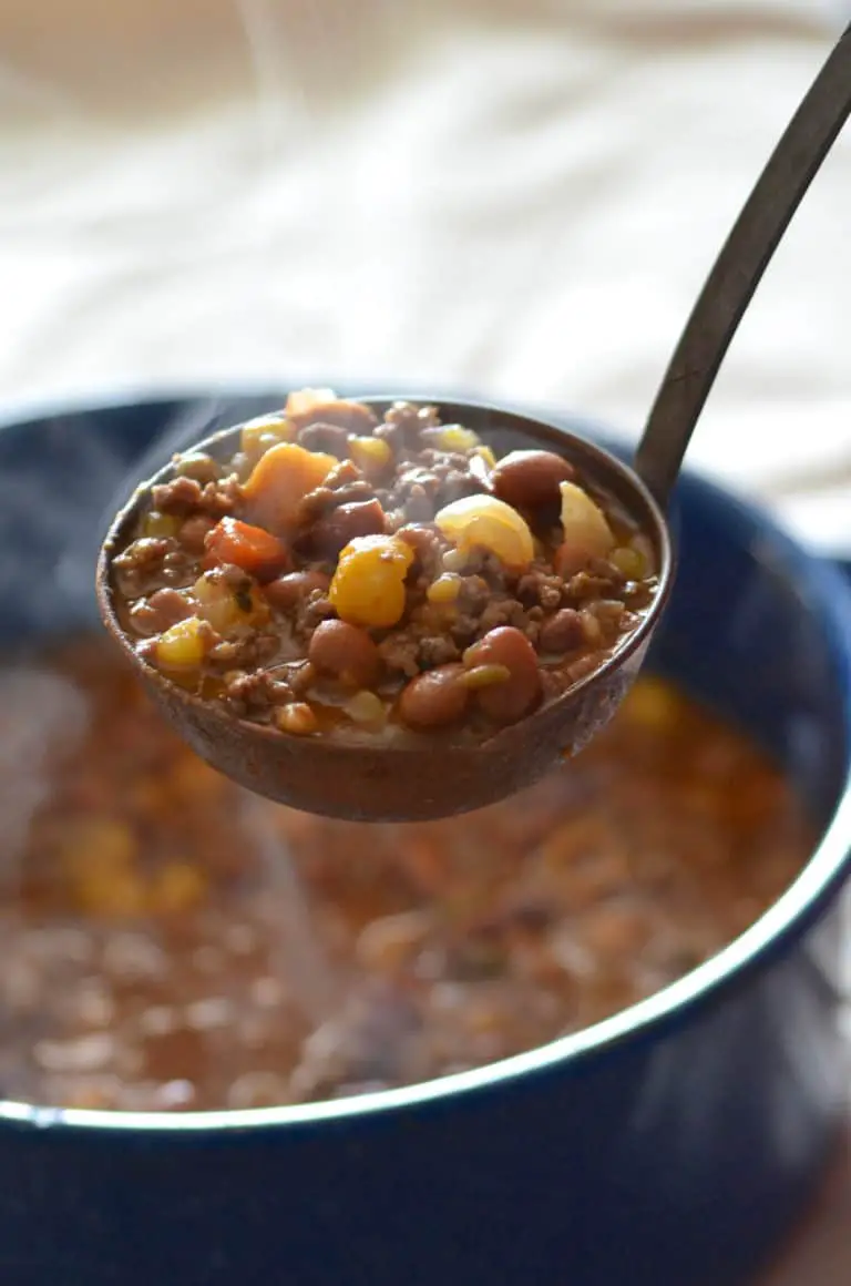 Steaming pot of beef and bean stew.