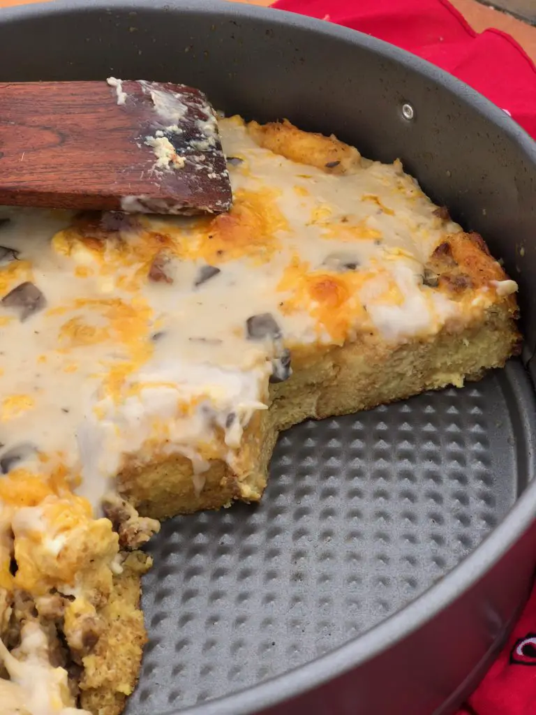 Cheesy breakfast casserole in a pan.