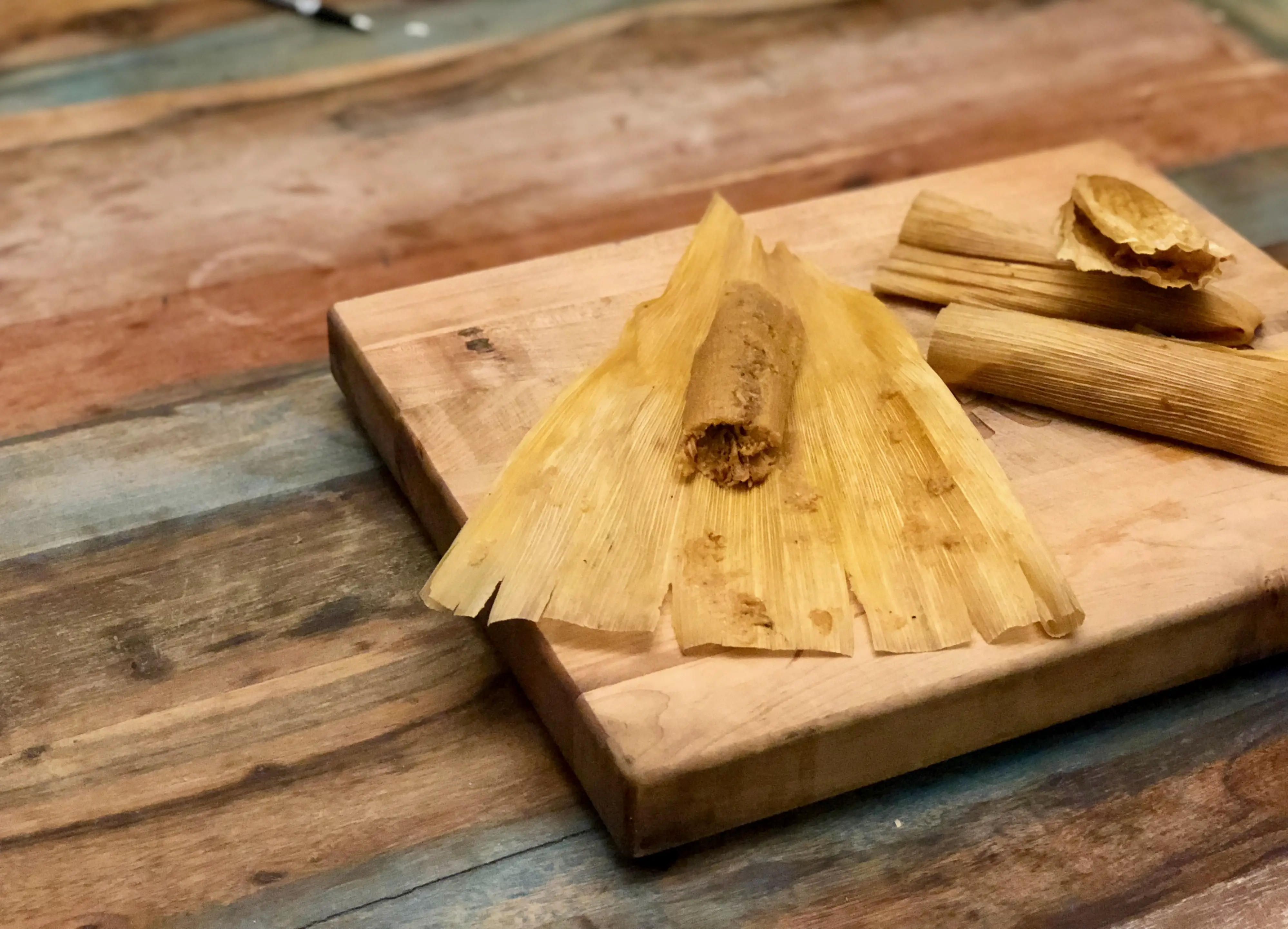 Authentic Homemade Tamales with Pork and Red Sauce | Kent Rollins