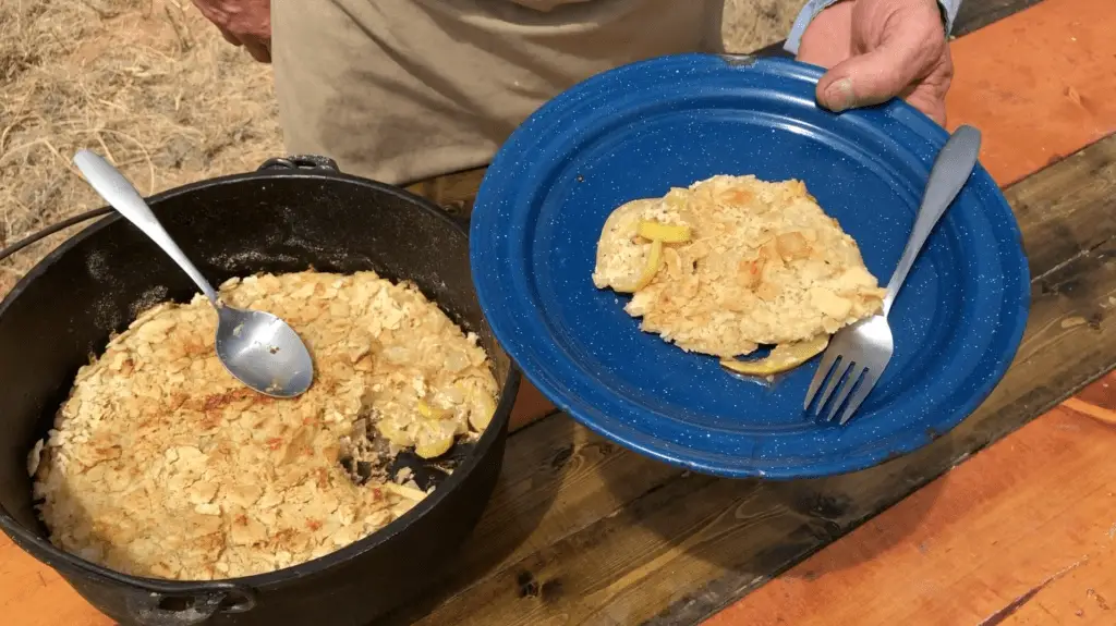 A serving of baked apples with a crispy top.