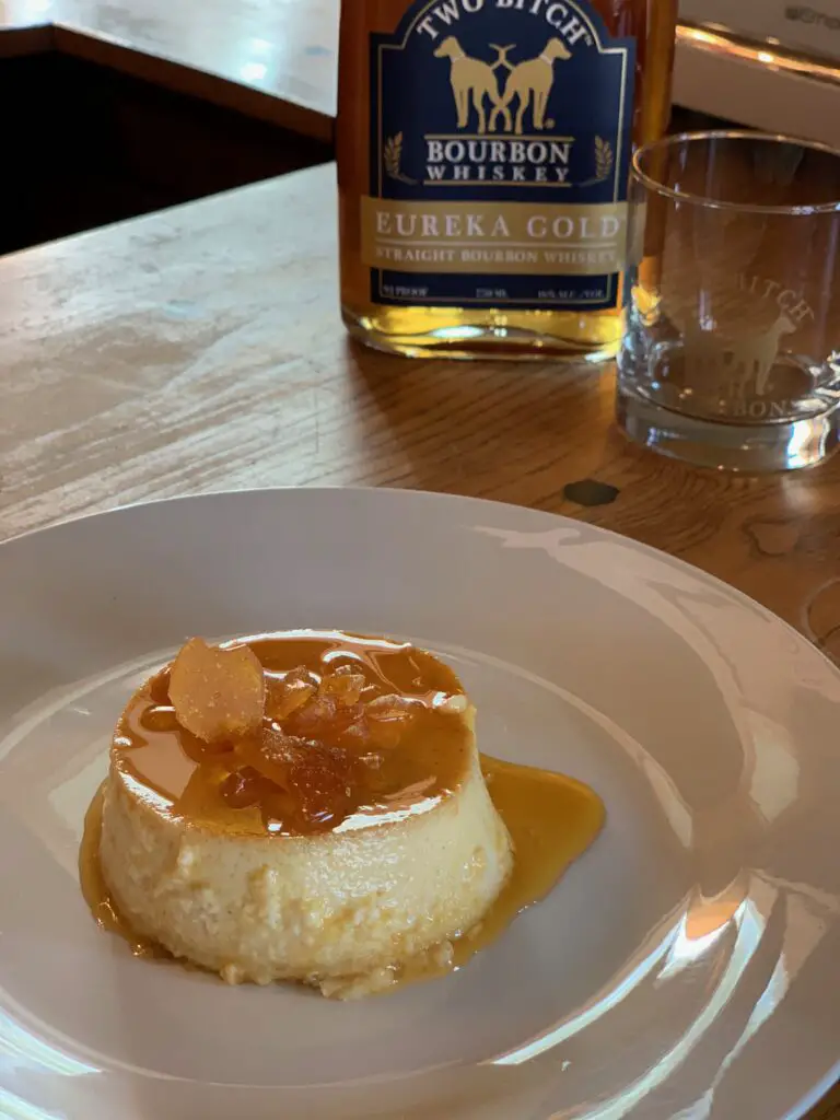 Caramel custard dessert with candied orange.