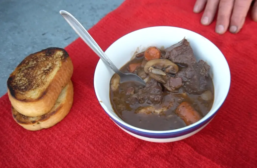 Beef stew with mushrooms and carrots.