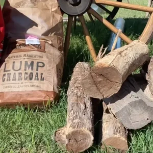 Bags of lump charcoal and firewood.