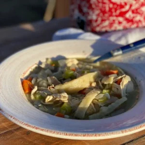 A bowl of soup on the table