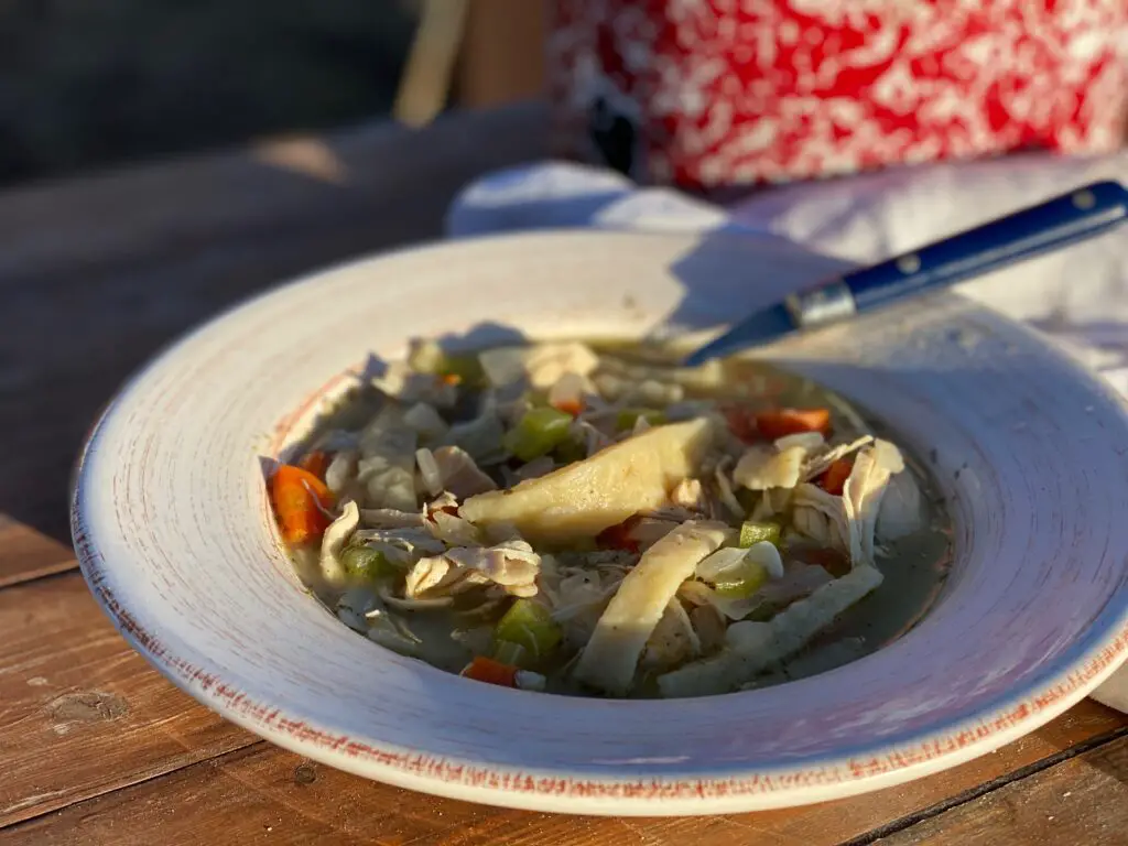 A bowl of soup on the table