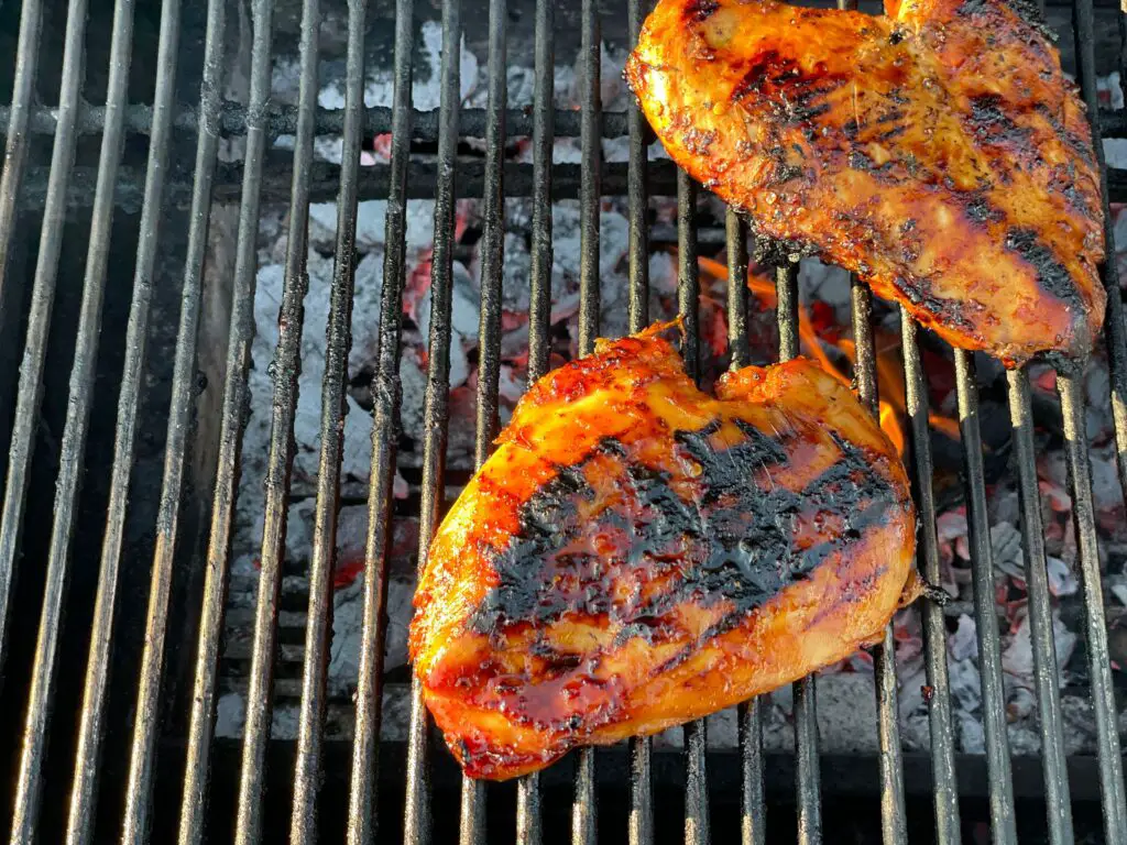 A grill with some meat on it