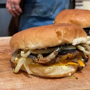 A close up of a burger on a bun