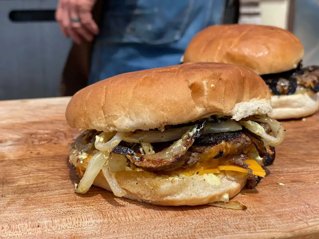 A close up of a burger on a bun