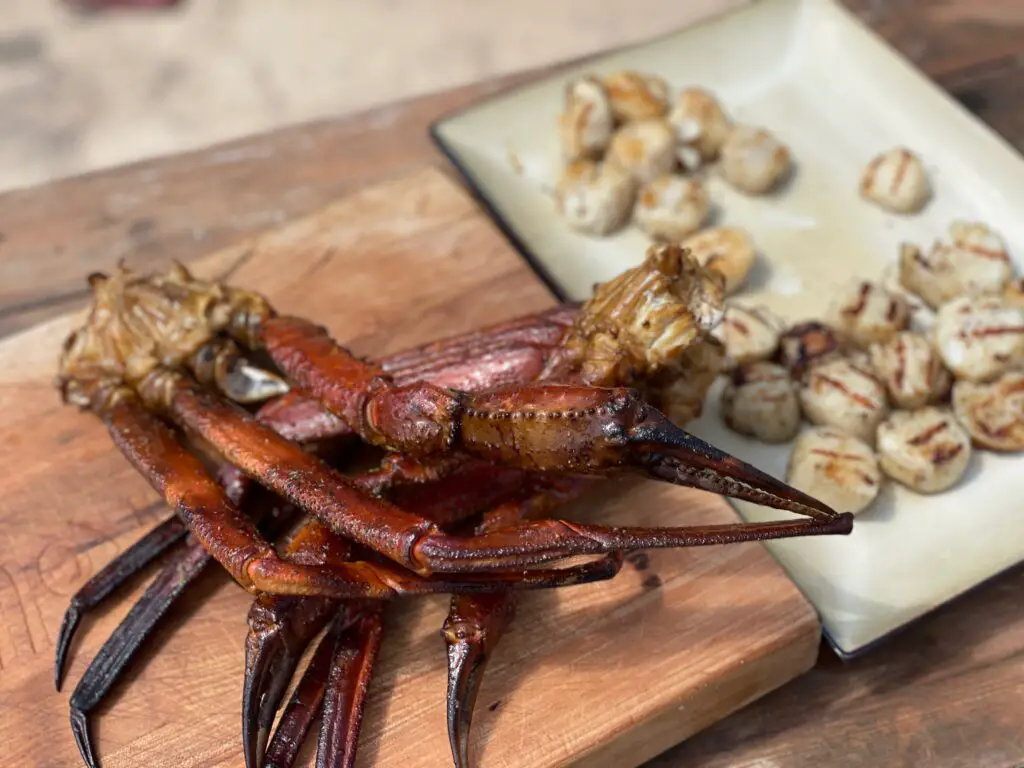 A plate of food on top of a wooden table.