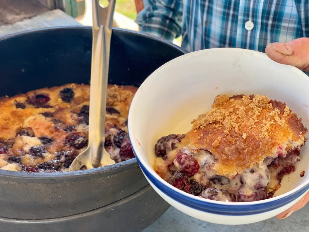 A person holding a bowl of food in front of another bowl.