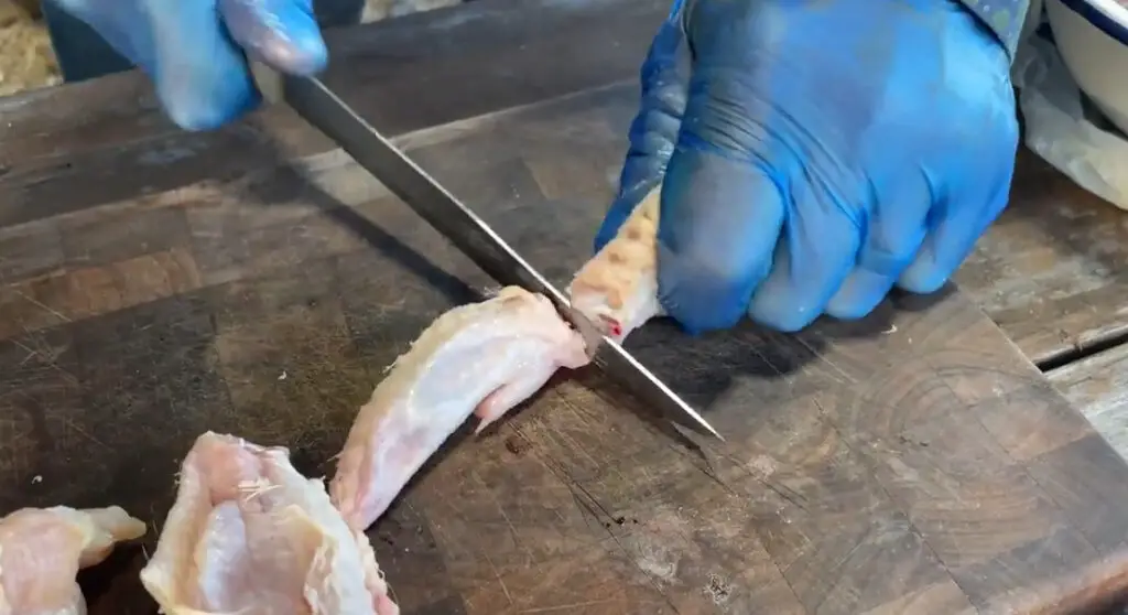 How do I cut a whole chicken wing?