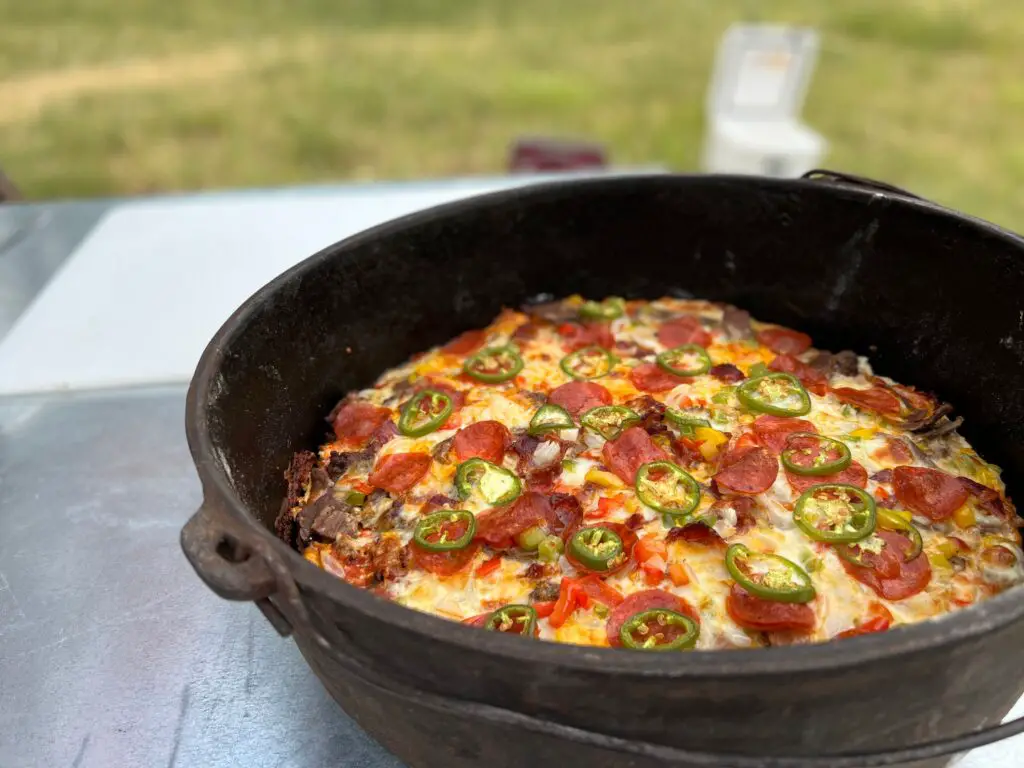 Kent Rollins Meat Lovers Pizza in Dutch Oven