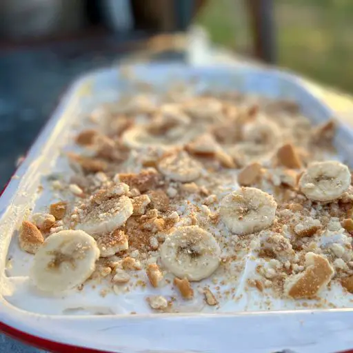 A white tray with some food on top of it