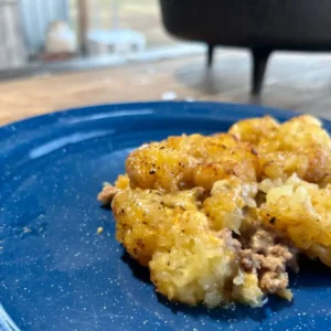 A blue plate with some food on it