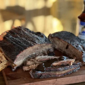 A close up of some meat on a cutting board