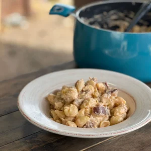 A bowl of food on top of a table.