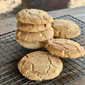 A close up of cookies on a cooling rack