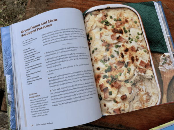 Scalloped potatoes with ham and green onions.