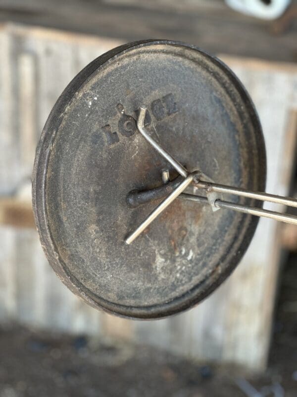 Vintage Lodge cast iron pan lid.