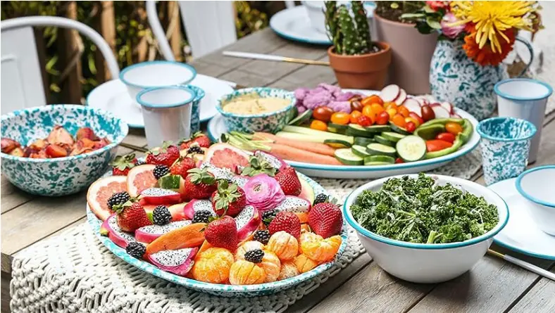 A table with plates of food on it