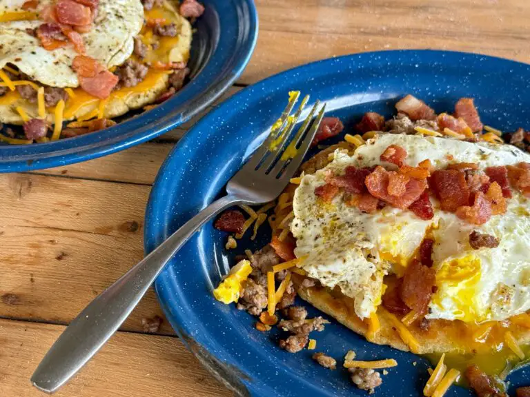 Cowboy Kent Rollins' Mexican Breakfast skillet with homemade tostada, sausage, bacon, and over=easy egg.