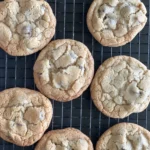 A close up of cookies on a cooling rack