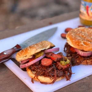 A close up of a sandwich on a cutting board