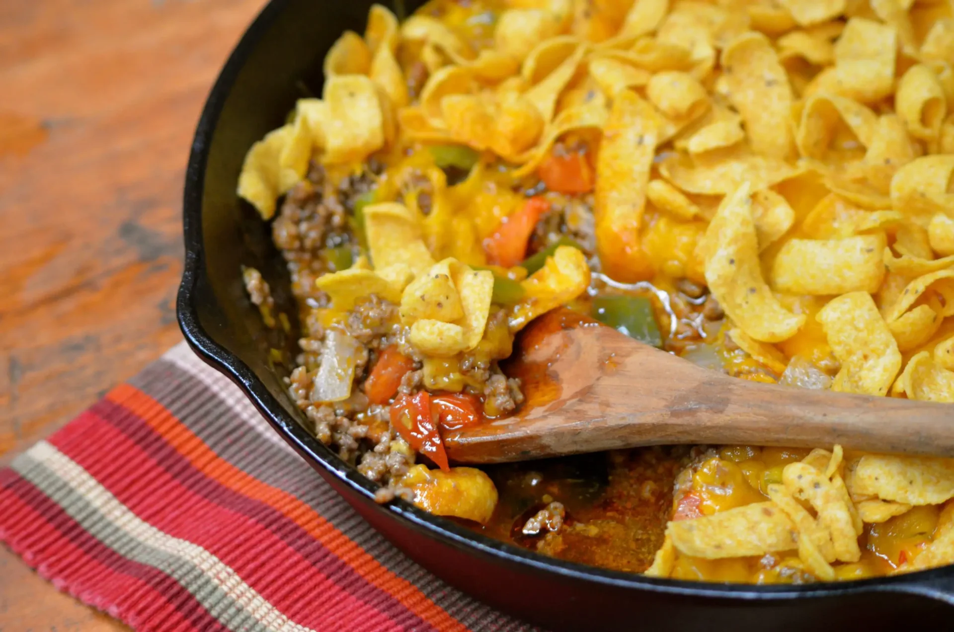 A pan of food with noodles and meat.