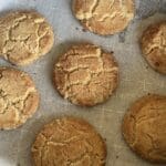 A bunch of cookies are on the pan