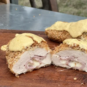 A piece of food sitting on top of a wooden table.