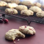 A close up of cookies on a cooling rack