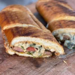 A close up of two sandwiches on a table