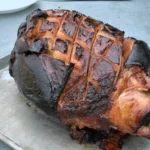 A close up of a meat on top of a table