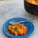 A blue plate with food on it