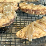 A close up of some pastries on a rack