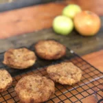 A close up of some cookies on a rack