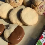 A plate of cookies and some other food