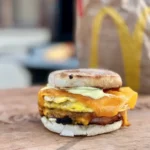 A close up of an egg muffin sandwich