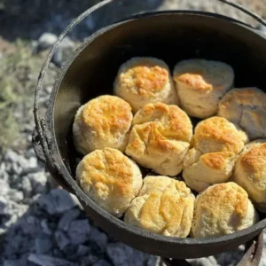 Freshly baked biscuits in a cast iron pot.